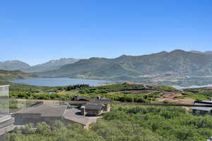 Mountain view featuring a nearby body of water