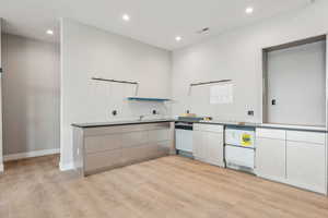 Kitchen with visible vents, recessed lighting, and light wood-type flooring