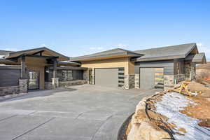 Prairie-style house with a garage