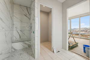 Bathroom featuring a mountain view and tile patterned flooring