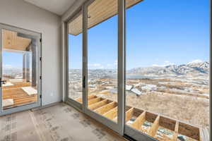 Doorway to outside featuring a mountain view