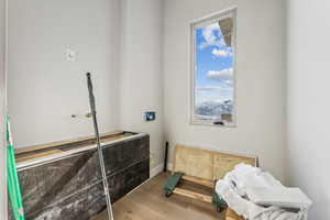 Interior space featuring a healthy amount of sunlight and wood finished floors