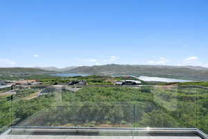 View of mountain background with a large body of water