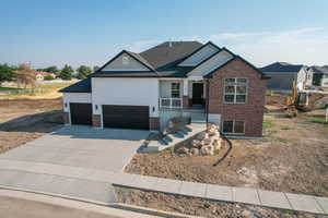 View of front of home with covered porch