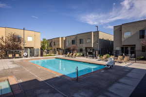 View of swimming pool with a patio area