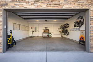 Garage with a garage door opener and electric panel