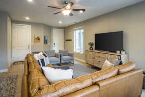 Tiled living room with ceiling fan