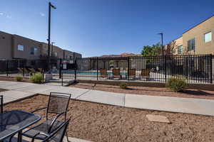 View of home's community featuring a pool