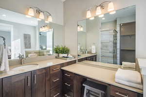 Bathroom with vanity and walk in shower