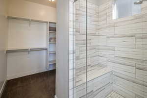 Bathroom with tiled shower