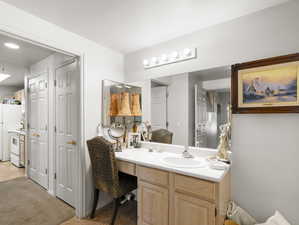 Bathroom featuring vanity and tile patterned flooring