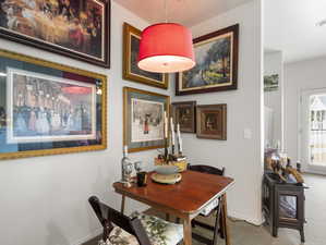 View of carpeted dining room