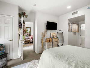 View of carpeted bedroom