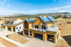 Property under construction featuring a mountain view