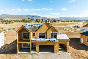 View of front of house with a mountain view