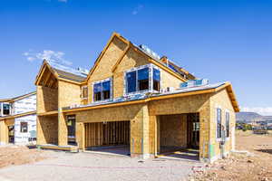 Unfinished property featuring a mountain view