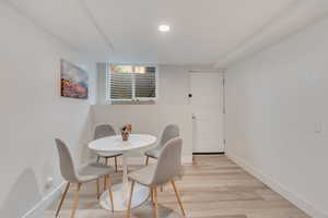 Dining space featuring light wood-type flooring