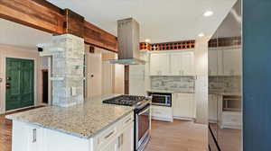 Updated Kitchen with gas range, quartz countertops, Blanco sink, updated faucet, Samsung Smart fridge (negotiable)