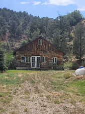 Log-style house with french doors