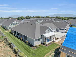 Birds eye view of property with a mountain view