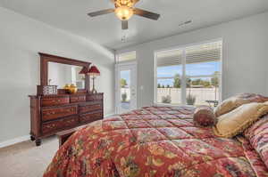 Bedroom featuring access to outside, ceiling fan, and light colored carpet