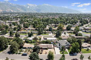 Birds eye view of property with a mountain view