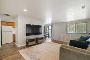 Living room featuring light wood-type flooring