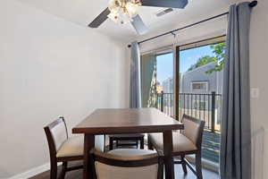 Dining room featuring ceiling fan and hardwood / wood-style floors