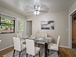 Dining room featuring hardwood / wood-style flooring and ceiling fanVIRTUALLY STAGED