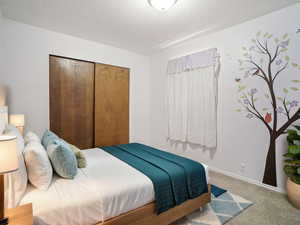 Carpeted bedroom with a VIRTUALLY STAGED