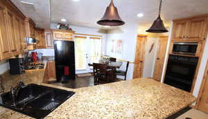 Beautiful kitchen with new cooktop and microwave