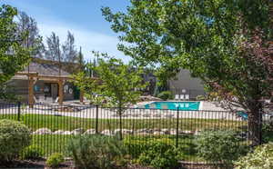 View of the pool area, featuring mountain views, and patio area