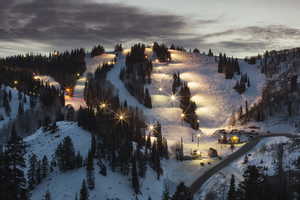 Night skiing with stunning nighttime winter mountain views