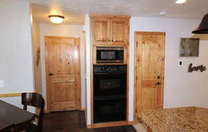 Beautiful kitchen with new cooktop and microwave