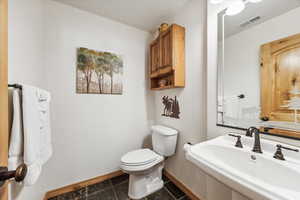 Half bathroom conveniently located 1/2 bath on the main level