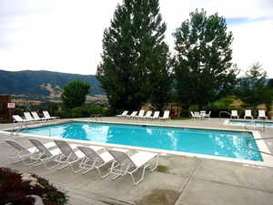 View of the pool area, featuring mountain views, and patio area