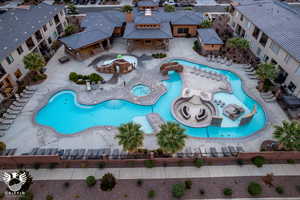 View of swimming pool featuring a patio and a gazebo