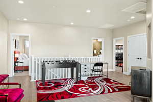 Bedroom with light wood-type flooring