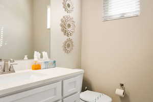 Bathroom with vanity and toilet