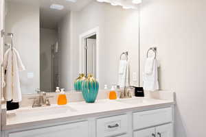 Bathroom featuring double vanity