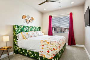 Bedroom featuring carpet floors and ceiling fan