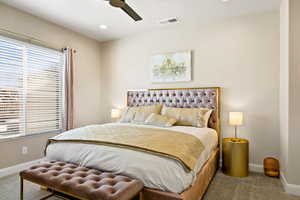 Bedroom with carpet flooring and ceiling fan