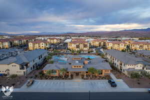 Birds eye view of property with a mountain view