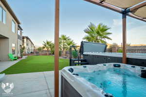 View of patio / terrace featuring a hot tub