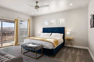 Carpeted bedroom with ceiling fan and access to exterior