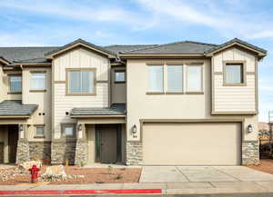 View of front of home with a garage