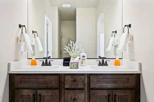 Bathroom featuring double vanity