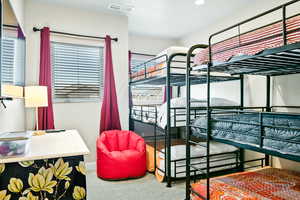 Bedroom featuring carpet flooring