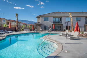 View of swimming pool featuring a patio