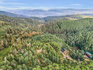 Birds eye view of property featuring a mountain view